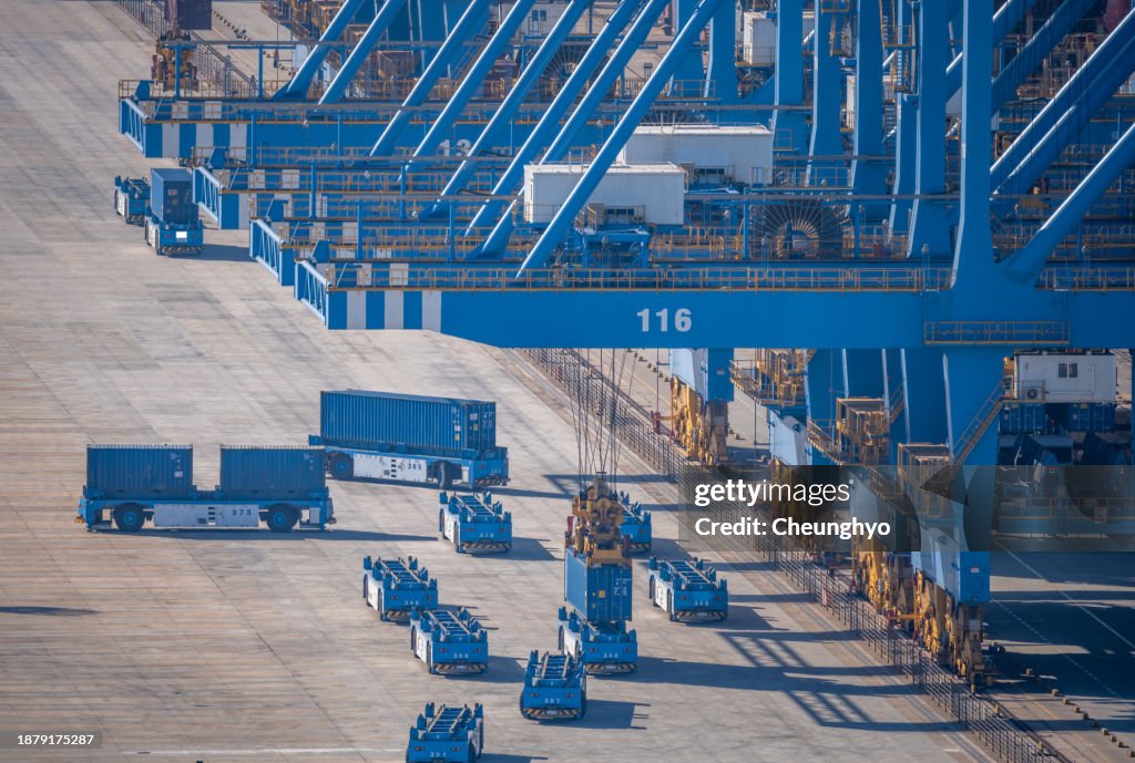 Close-up: High Angle View of Loading Dock in Qingdao Qianwan Container Terminal. East China's Shandong Province