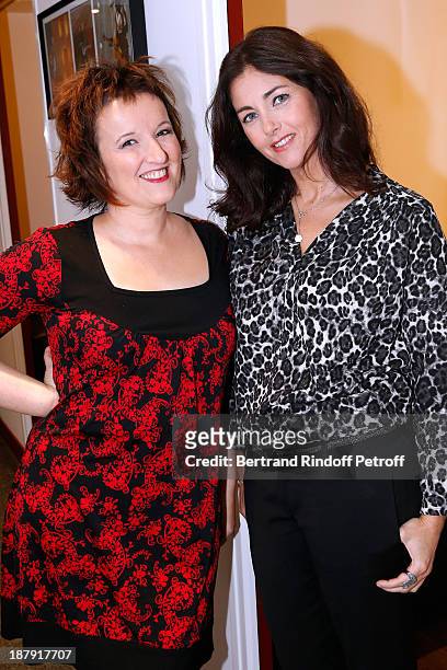 Humorist Anne Roumanoff and actress Cristiana Reali attend the 'Vivement Dimanche' French TV Show, held at Pavillon Gabriel on November 13, 2013 in...