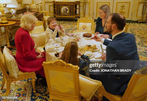 Seven-year-old Olivia Taylor , a blind schoolgirl with a brain tumour, along with her sister Imogen , father Matt , and mother Lisa take tea with...