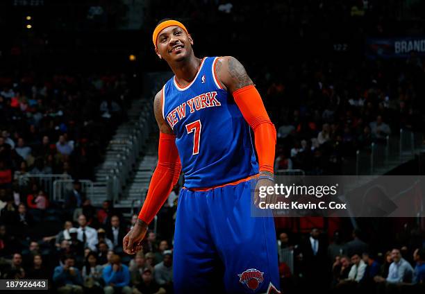 Carmelo Anthony of the New York Knicks reacts between free throws against the Atlanta Hawks at Philips Arena on November 13, 2013 in Atlanta,...