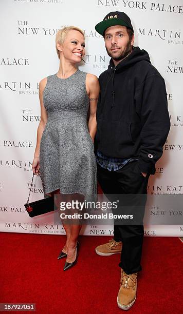Pamela Anderson and Rick Salomon attend The Martin Katz Jewel Suite Debuts At The New York Palace Hotel on November 13, 2013 in New York City.