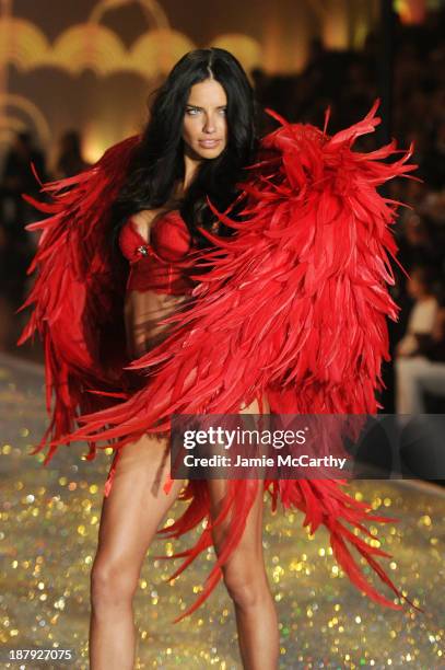 Model Adriana Lima walks the runway at the 2013 Victoria's Secret Fashion Show at Lexington Avenue Armory on November 13, 2013 in New York City.