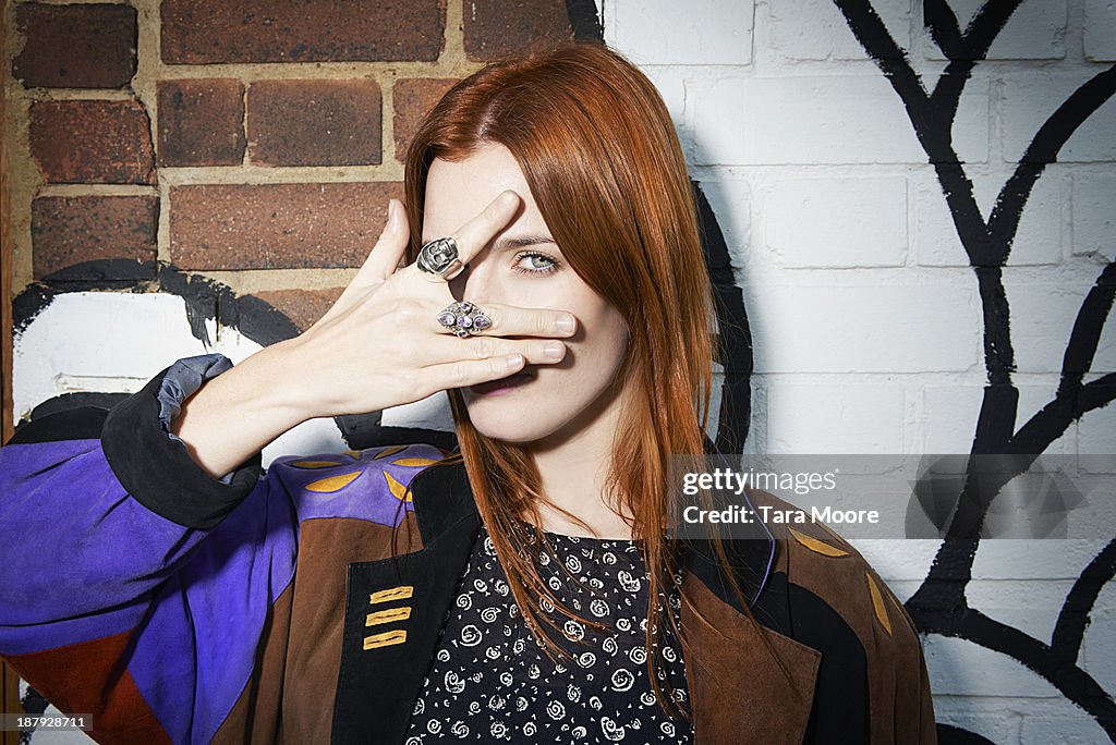 Trendy woman posing for camera