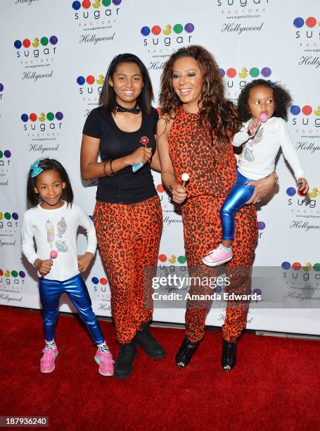 Singer Mel B and her daughters Angel Iris Murphy Brown, Phoenix Chi Gulzar and Madison Brown Belafonte arrive at the grand opening of Sugar Factory...