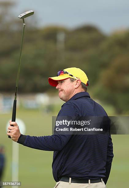 Jarrod Lyle of Australia acknowledges the crowd after playing round one of the 2013 Australian Masters at Royal Melbourne Golf Course on November 14,...