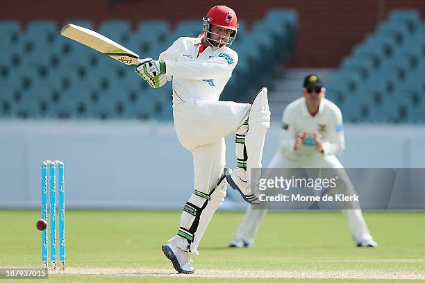 Phillip Hughes of the Redbacks bats during day two of the Sheffield Shield match between the Redbacks and the Warriors at Adelaide Oval on November...