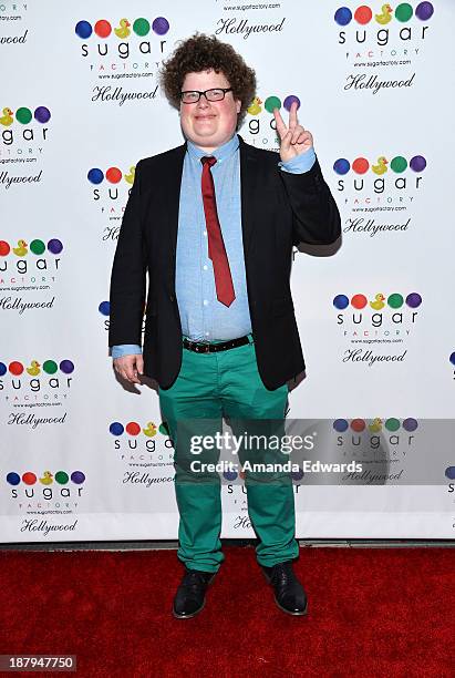 Actor Jesse Heiman arrives at the grand opening of Sugar Factory Hollywood at Sugar Factory on November 13, 2013 in Hollywood, California.