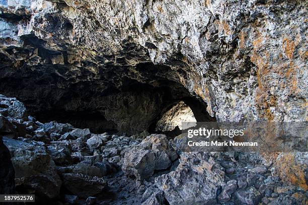 indian tunnel lava tube - lava tube stock pictures, royalty-free photos & images