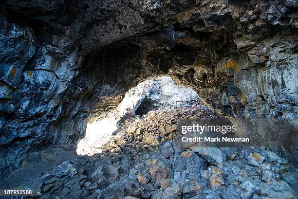 indian tunnel lava tube - lava tube stock pictures, royalty-free photos & images