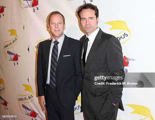Actors Kiefer Sutherland and Jason Patric attend the "Stand Up For Gus" Benefit at Bootsy Bellows on November 13, 2013 in West Hollywood, California.