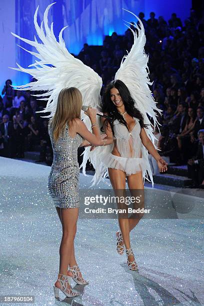 Model Adriana Lima at the 2013 Victoria's Secret Fashion Show at Lexington Avenue Armory on November 13, 2013 in New York City.