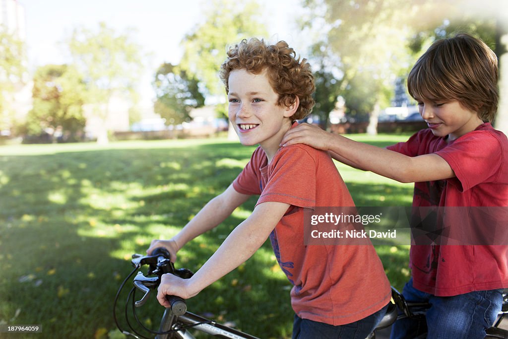 Boy Playing Example Boys Playing Outside In The Park High-Res Stock Photo - Getty Images