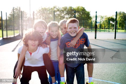 Boy Playing Example Boys Playing Outside In The Park High-Res Stock Photo - Getty Images