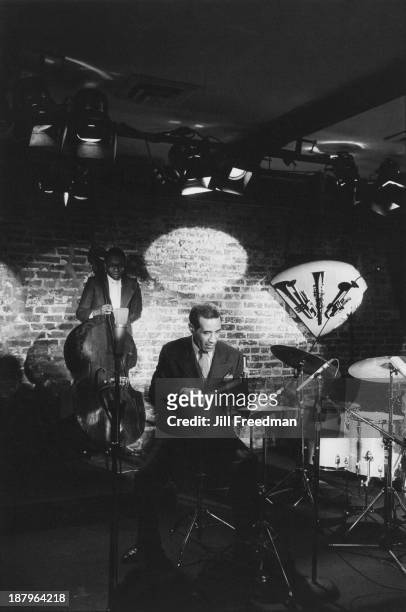 American jazz percussionist, drummer, and composer Max Roach and double bass player Calvin Hill perform at the 'Blues Alley' club, Washington DC,...