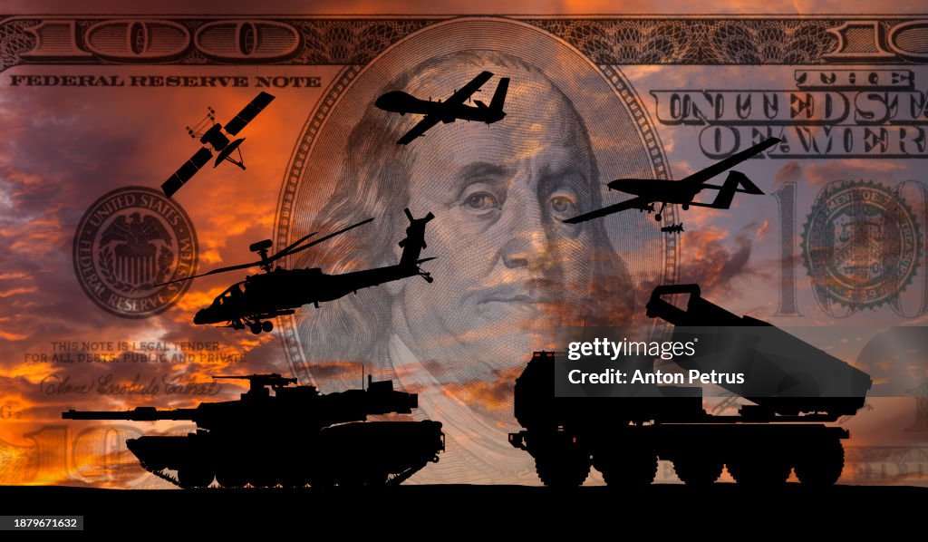 Tank, helicopter, drones, MLRS on a background of 100 US dollars