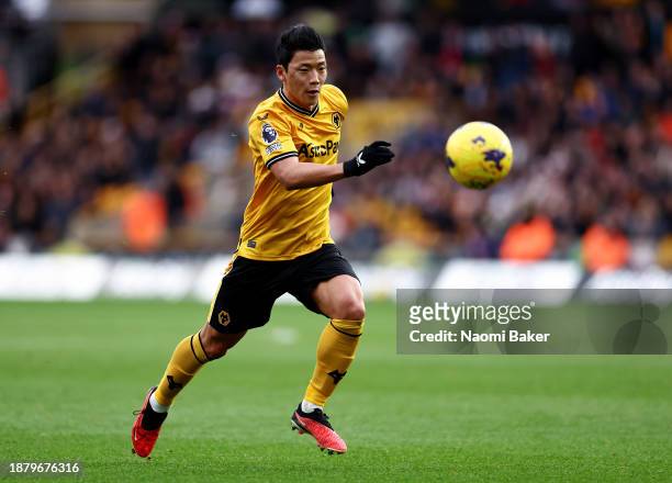 Hwang Hee-Chan of Wolverhampton Wanderers breaks with the ball during the Premier League match between Wolverhampton Wanderers and Chelsea FC at...
