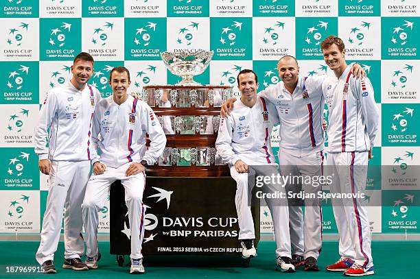 Players of the Czech Republic team Jan Hayek, Lukas Rosol, Tomas Berdych, Radek Stepanek and captain Vladimir Safarik pose for photographers during a...