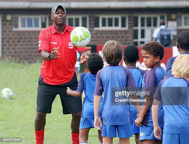 Michael Thomas during the Liverpool FC Legends Tour, CSI and Coaching Clinic at Siphosethu Primary School on November 14, 2013 in Mount Edgecombe,...