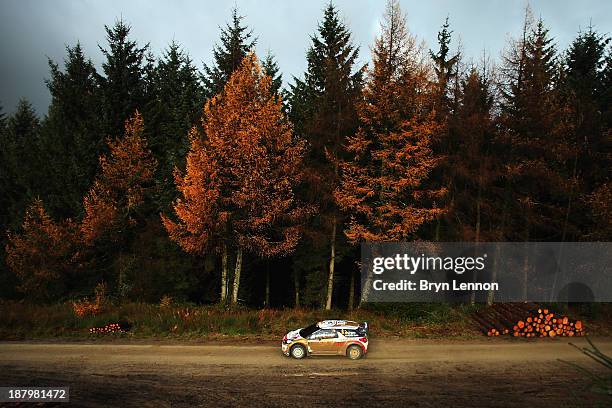 Dani Sordo and Carlos Del Barrio of Spain drive the Citroen DS3 WRC on the qualifying stage for the FIA World Rally Championship Great Britain on...