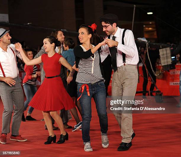 Dancers perform on the red carpet during The 8th Rome Film Festival on November 14, 2013 in Rome, Italy.