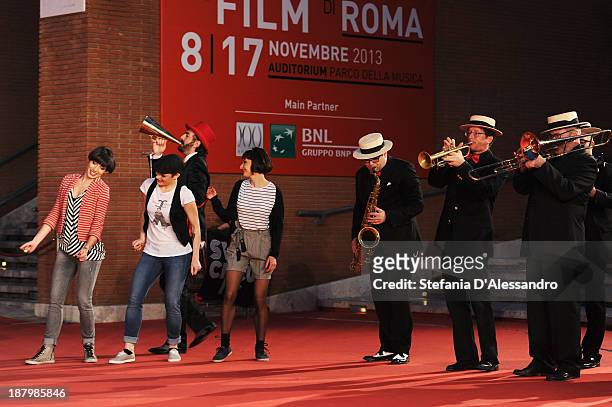 Dancers perform on the red carpet during The 8th Rome Film Festival on November 14, 2013 in Rome, Italy.