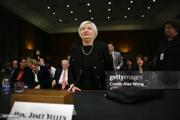 Nominee for the Federal Reserve Board Chairman Janet Yellen leaves after her confirmation hearing November 14, 2013 on Capitol Hill in Washington,...
