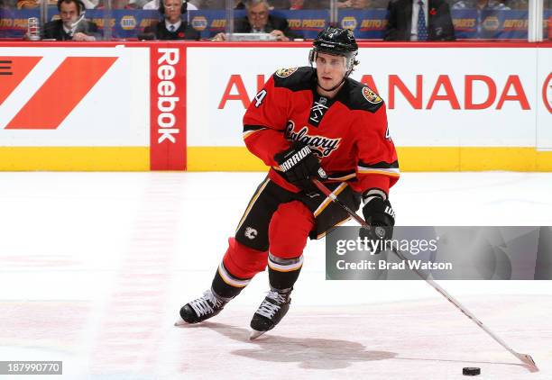 Kris Russell of the Calgary Flames skates against the Detroit Red Wings at Scotiabank Saddledome on November 1, 2013 in Calgary, Alberta, Canada. The...