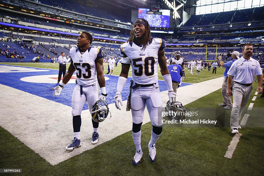 Ray Rams Daren Bates and Ray-Ray Armstrong of the St. Louis Rams walk off the ...