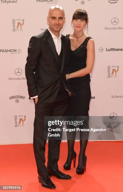 Josep Guardiola and his wife Cristina Serra attends the Bambi Awards 2013 at Stage Theater on November 14, 2013 in Berlin, Germany.