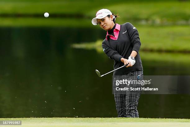 Ai Miyazato of Japan hits a pitch shot on the fourth hole during the first round of the Lorena Ochoa Invitational Presented by Banamex and Jalisco at...