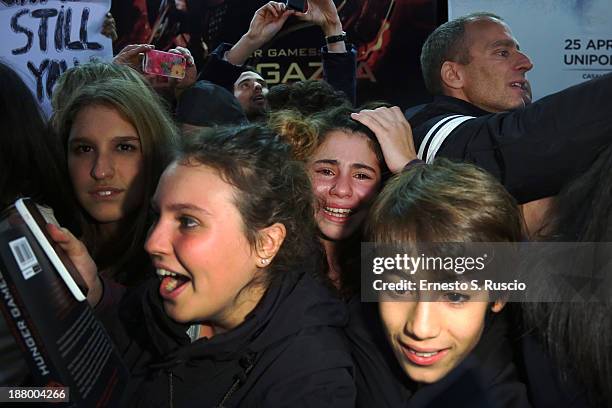 Fans attend the 'The Hunger Games: Catching Fire' Premiere during The 8th Rome Film Festival at Auditorium Parco Della Musica on November 14, 2013 in...