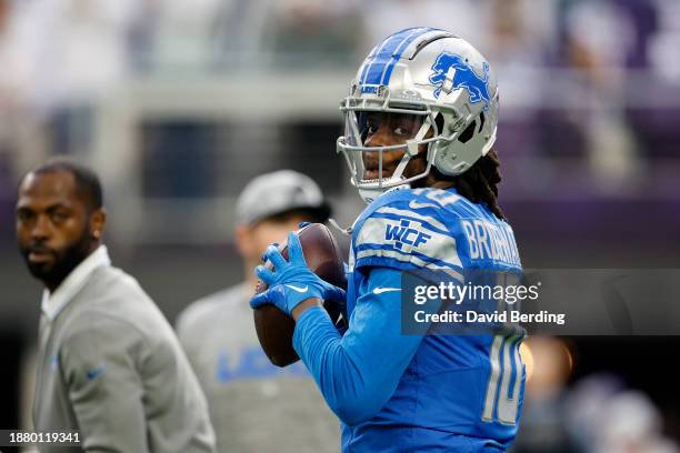 Teddy Bridgewater of the Detroit Lions warms up prior to the game against the Minnesota Vikings at U.S. Bank Stadium on December 24, 2023 in...