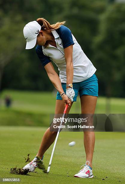 Michelle Wie of the USA hits her approach shot on the 15th hole during the first round of the Lorena Ochoa Invitational Presented by Banamex and...