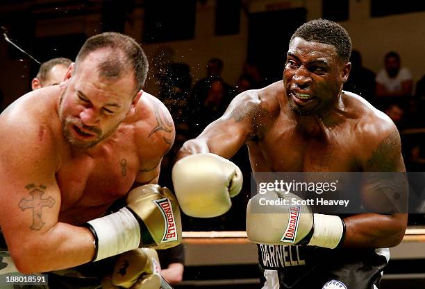 Michael Sprott of Great Britain in action wtih Jason Gavern of USA during the Heavyweight Prizefighter final York Hall on November 14, 2013 in...