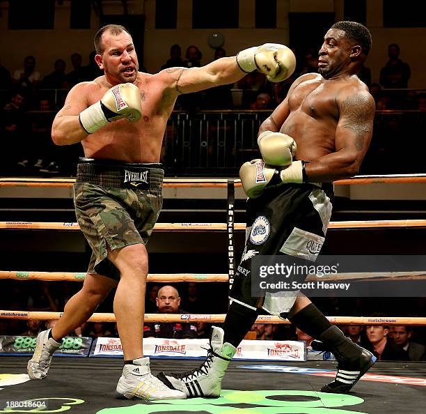 Michael Sprott of Great Britain in action wtih Jason Gavern of USA during the Heavyweight Prizefighter final York Hall on November 14, 2013 in...