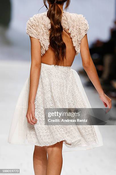 Model walks the runway at the Seam show during Mercedes-Benz Fashion Days Zurich 2013 on November 14, 2013 in Zurich, Switzerland.