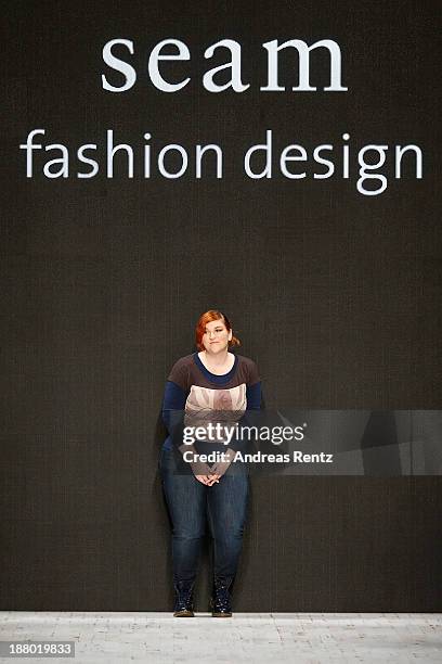 Designer Sybille Kuhn on the runway after the Seam show during Mercedes-Benz Fashion Days Zurich 2013 on November 14, 2013 in Zurich, Switzerland.