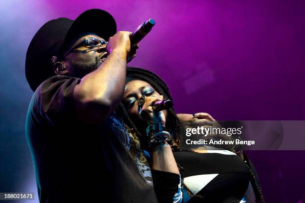 Jazzie B and Caron Wheeler of Soul II Soul perform on stage at The Ritz, Manchester on November 14, 2013 in Manchester, United Kingdom.