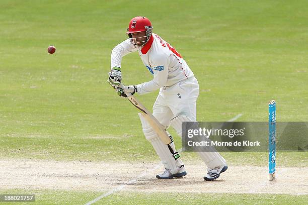 Phillip Hughes of the Redbacks bats during day three of the Sheffield Shield match between the Redbacks and the Warriors at Adelaide Oval on November...