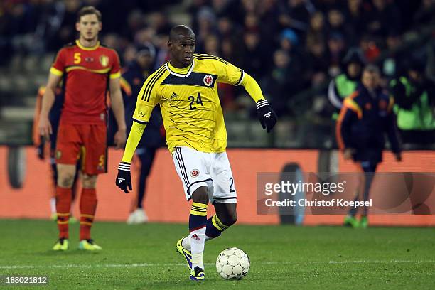Victor Ibarbo of Colombia runs with the ball during the international friendly match between Belgium and Colombia at King Badouin stadium on November...