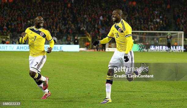 Victor Ibarbo of Colombia celebrates scoring their second goal with team mate Pablo Armero during a FIFA Friendly match between Colombia and Belgium...