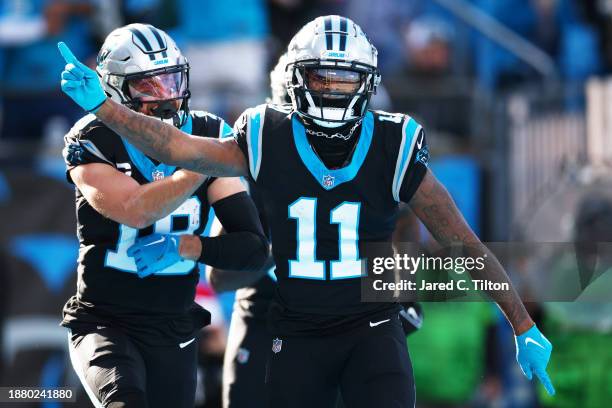 Ihmir Smith-Marsette of the Carolina Panthers celebrates after scoring a rushing touchdown during the second quarter against the Green Bay Packers at...