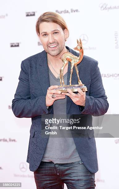 David Garrett poses with the Bambi for Classic at Stage Theater on November 14, 2013 in Berlin, Germany.