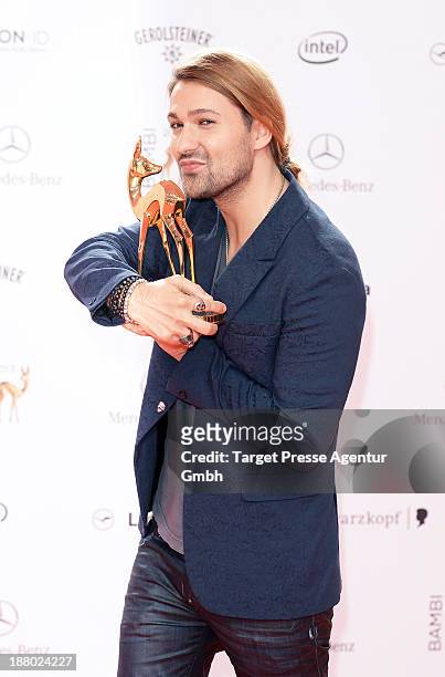 David Garrett poses with the Bambi for Classic at Stage Theater on November 14, 2013 in Berlin, Germany.