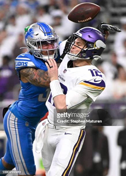 Brian Branch of the Detroit Lions pressures Nick Mullens of the Minnesota Vikings during the second quarter at U.S. Bank Stadium on December 24, 2023...