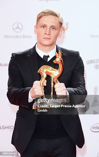 Matthias Schweighoefer poses with the Bambi for best film at the Bambi Awards at Stage Theater on November 14, 2013 in Berlin, Germany.
