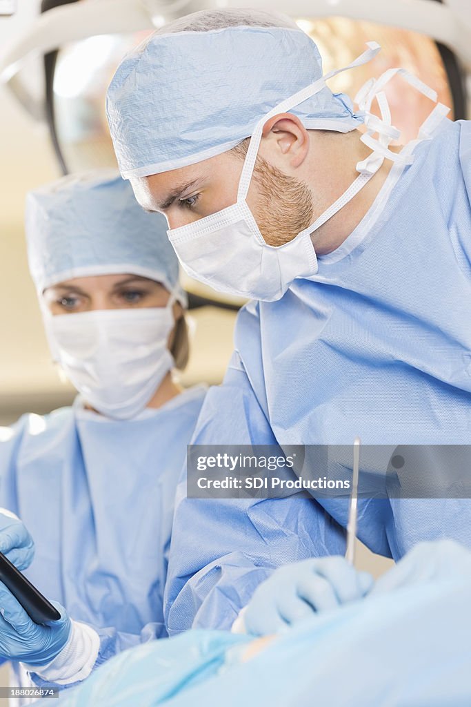 Surgeon using new technology during surgical procedure