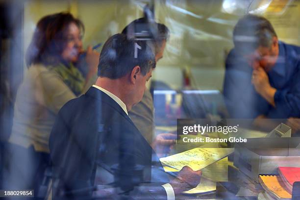 Officials count provisional ballots in the Lawrence Election Department office in the basement of City Hall. The winner of the Lawrence mayoral race...