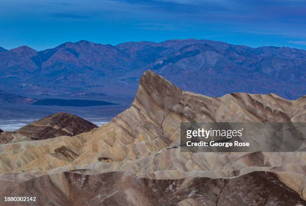 The iconic overlook at Zabriskie Point is viewed at sunrise on December 15 near Furnace Creek, California. Death Valley National Park, the largest...