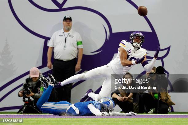 Justin Jefferson of the Minnesota Vikings catches a touchdown reception against Cameron Sutton of the Detroit Lions during the second quarter at U.S....